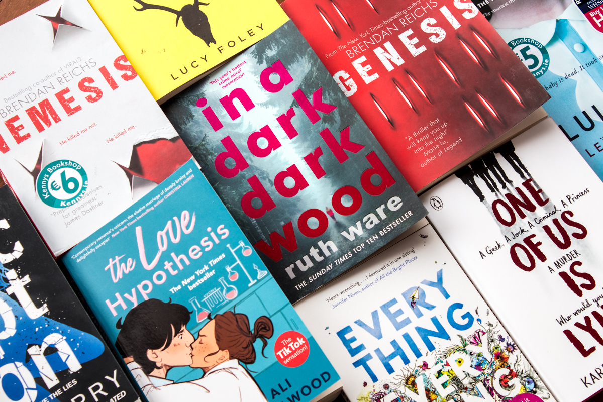 Various books in rows next to each other.