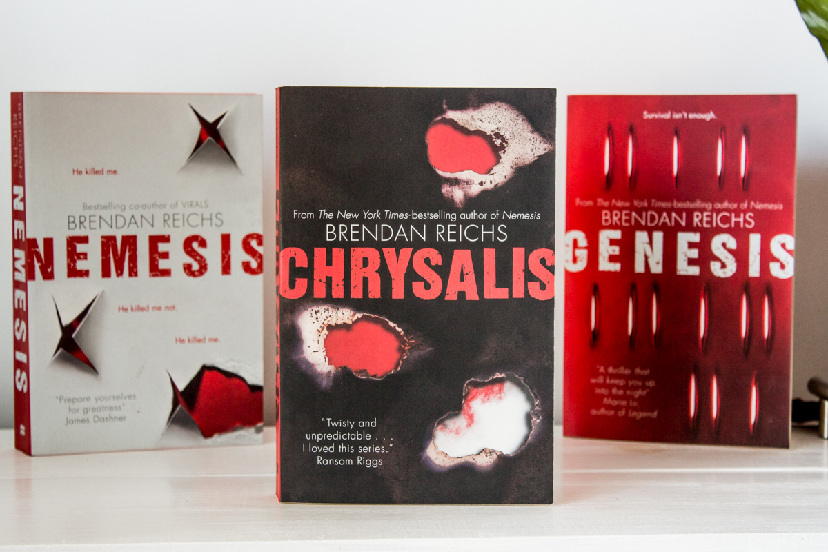 The three books in the Project Nemesis series standing upright.