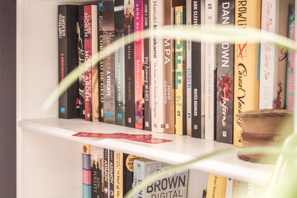 Bookshelf with unread books.