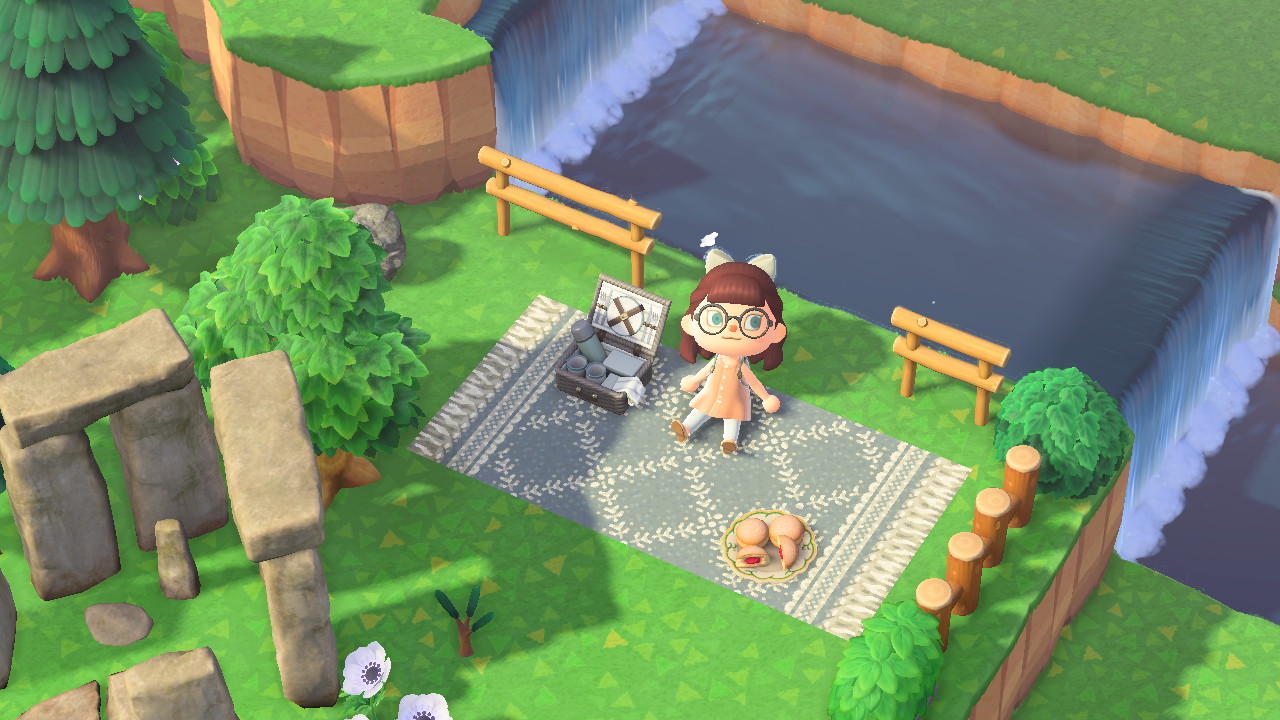 In game image: sitting on a picnic blanket.